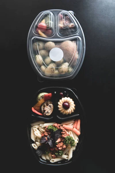 Collection of take away foil boxes with healthy food.n of take away foil boxes with healthy food.Healthy food in box. Fresh box . lifestyle, day meal plan