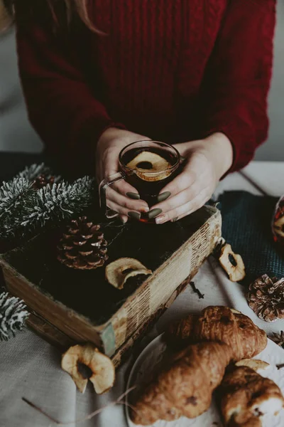 rink Tea relax cosy photo with blurred background. Female hands holding mug of hot Tea in morning. Young woman relaxing tea cup on hand. Good morning Tea or Have a happy day message concept