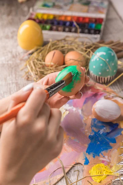 Easter composition with Easter eggs on wooden background — Stock Photo, Image