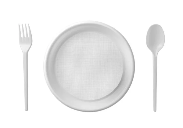 Plastik tabak, kaşık ve çatal beyaz arka planda izole edilmiş..