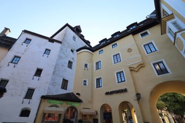 KITZBUEHEL, AUSTRIA - AUGUST 8, 2025: Historic townhouses with arcades and shops in the old town center. High quality photo