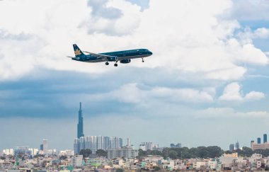 Ho Chi Minh City, Vietnam - 29 Temmuz 2018: Vietnam havayolu Airbus A321 açılış Tan Son Nhat Uluslararası Havaalanı Ho Chi Minh City, Vietnam için birden fazla pozlama fotoğraf teknolojisi ile. 