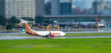 Ho Chi Minh City, Vietnam - 31 Temmuz 2018: Uçak Boeing 737 Malindo hava alarak, kapalı Tan oğlu Nhat Uluslararası Havalimanı Ho Chi Minh City, Vietnam. Malindo hava Malezya Havayolları ait.