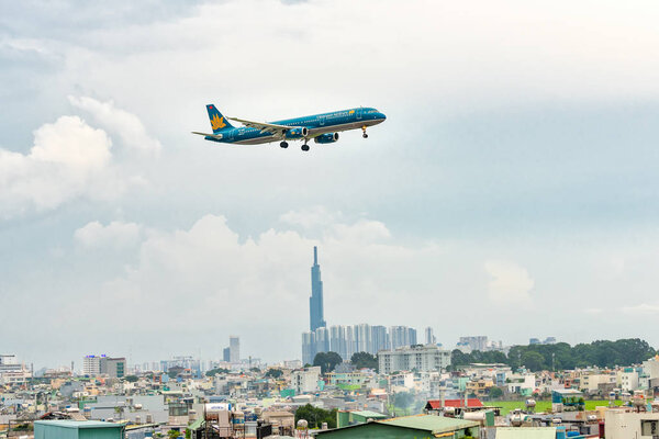 Ho Chi Minh City, Vietnam - July 29th, 2018: Vietnam airline Airbus A321 landing with multiple exposure photography technology at Tan Son Nhat International Airport in Ho Chi Minh City, Vietnam. 