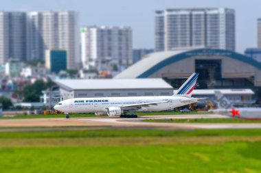 Ho Chi Minh City, Vietnam - August 12th, 2018: Boeing 777 passenger aircraft of Air France airline is preparing to take off at the Tan Son Nhat International Airport, Ho Chi Minh City, Vietnam. Air France is one of the world's largest airlines. clipart
