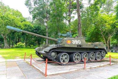 Ho Chi Minh city, Vietnam, August 24th, 2018: One of communist tanks attacked presidential palace of South Vietnam in April 1975. Today is the Palace of Unification in Ho Chi Minh city, Vietnam clipart