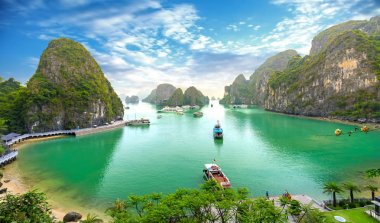 Beautiful landscape Halong Bay view from adove the Bo Hon Island. Halong Bay is the UNESCO World Heritage Site, it is a beautiful natural wonder in northern Vietnam clipart