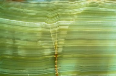 Soyut çizgilere sahip mineral taşları volkanik kayalardan oluşmuştur ve bu kayalar binlerce yıl boyunca doğada erimiş ve hızlandırılmıştır. Kapalı alanlarda döşeme ve duvar olarak dekore edilmişler.