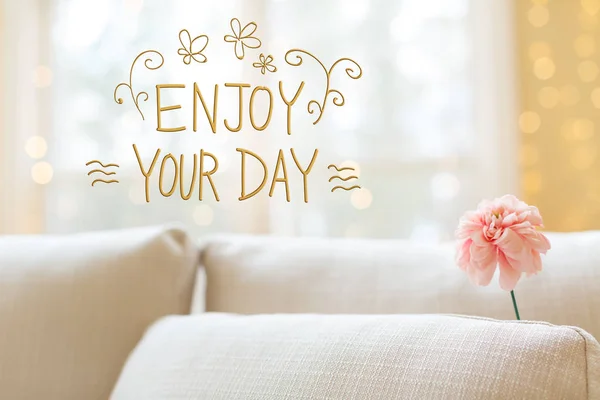 Enjoy Your Day message with flower in interior room sofa — Stock Photo, Image