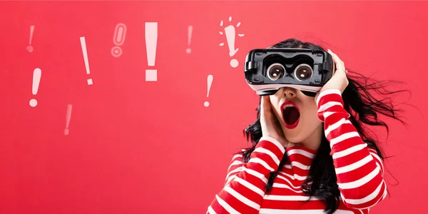 Exclamation Marks with woman using a virtual reality headset — Stock Photo, Image