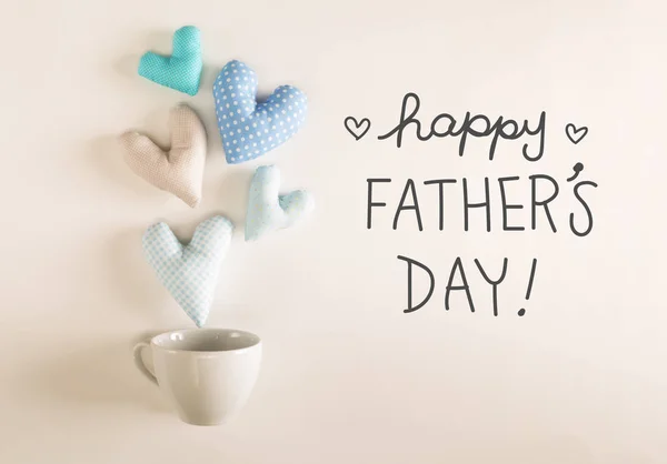 Fathers Day message with blue heart cushions — Stock Photo, Image