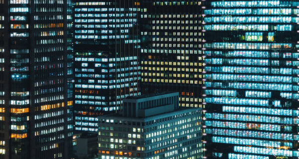 Skyscrapers illuminated at night in Tokyo, Japan