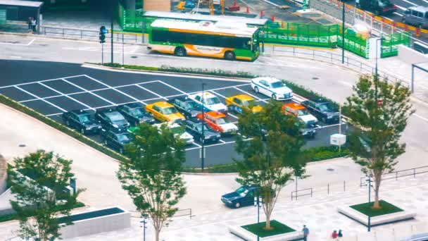 Timelapse de taxis frente a la estación de Tokio — Vídeos de Stock