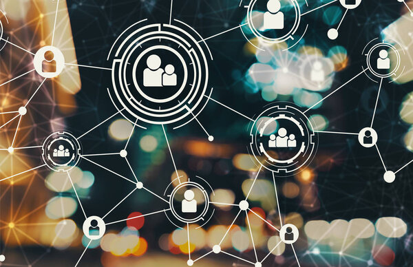 Социальные связи с размытыми городскими огнями
