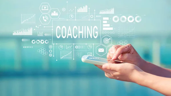 Coaching z smartphone — Zdjęcie stockowe