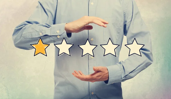 Bir Star Rating işadamı ile — Stok fotoğraf