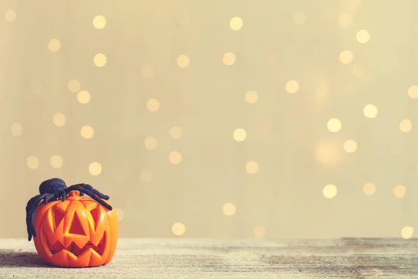 Halloween pompoen met spin — Stockfoto