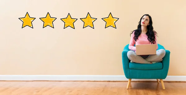 Five Star Rating with woman using a laptop — Stock Photo, Image