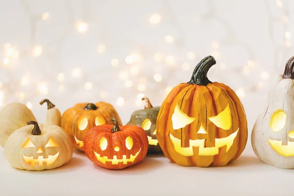 Halloween pumpkins with shiny lights — Stock Photo, Image