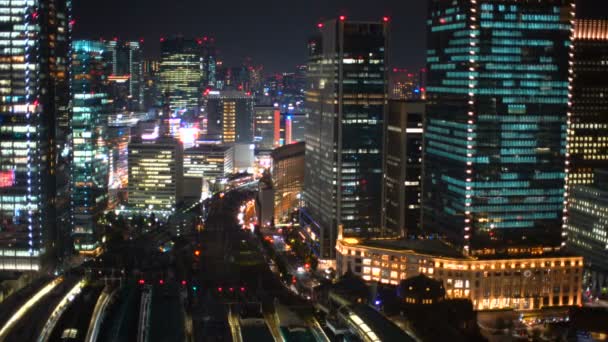 Vista aérea dos comboios que chegam e partem da Estação de Tóquio em Marunouchi, Tóquio — Vídeo de Stock