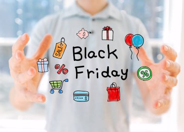 Black Friday ellerini tutan adamla