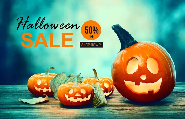 Halloween sale with pumpkins at night — Stock Photo, Image