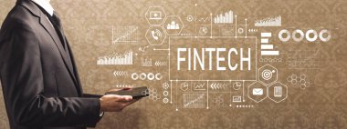 Bir tablet bilgisayar tutan işadamı ile fintech 