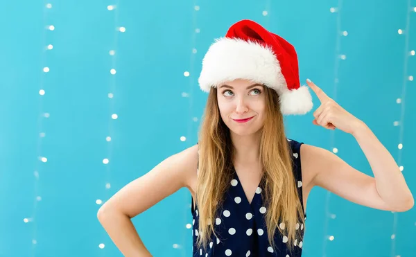 Mujer feliz con un sombrero de Santa — Foto de Stock