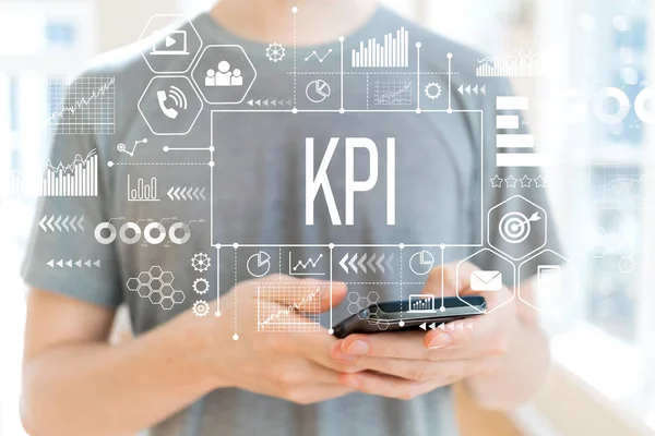 Kpi mit Mann per Smartphone — Stockfoto