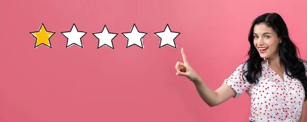 One star rating with young woman — Stock Photo, Image