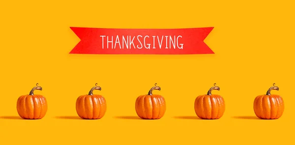 Thanksgiving message with orange pumpkins — Stock Photo, Image