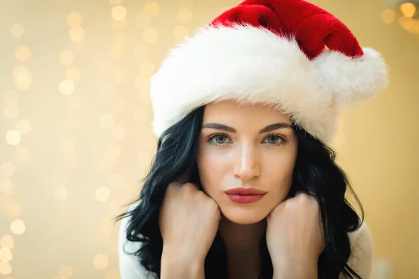 Happy woman with a Santa hat — Stock Photo, Image