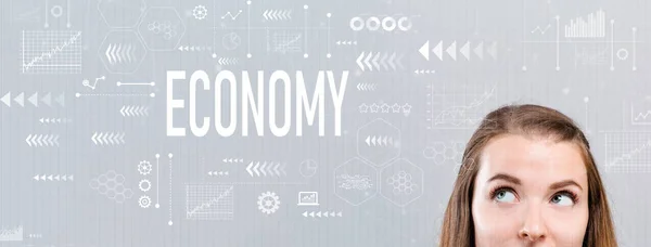 Economia com mulher jovem — Fotografia de Stock