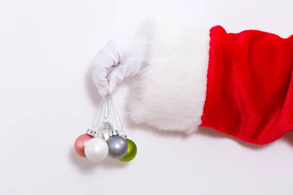 Noel baba holding küçük baubles — Stok fotoğraf