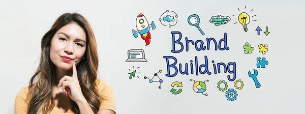 Brand Building con giovane donna — Foto Stock