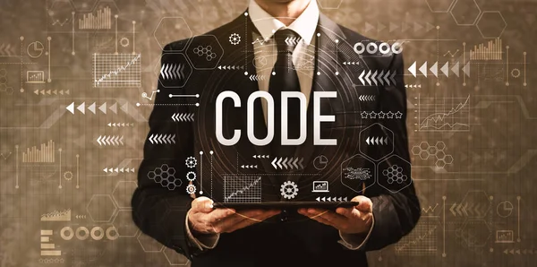 Code avec un homme d'affaires tenant une tablette — Photo