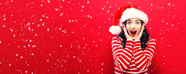 Happy young woman with Santa hat — Stock Photo, Image