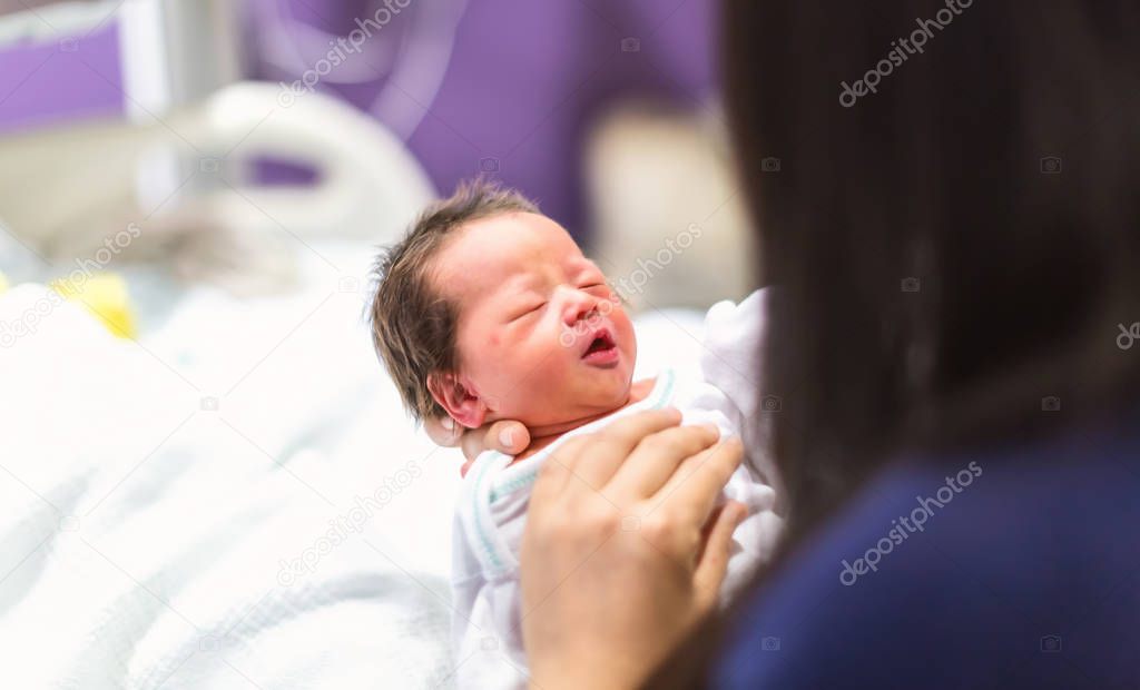 Newborn baby boy in the hospital