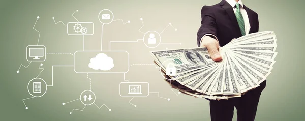 Computación en la nube con hombre de negocios con efectivo — Foto de Stock