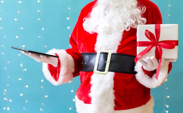 Babbo Natale con un tablet — Foto Stock