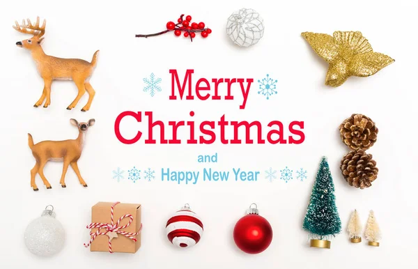 Merry Christmas and Happy New Year message with Christmas ornaments — Stock Photo, Image