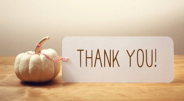 Thank you message with a small pumpkin clipart