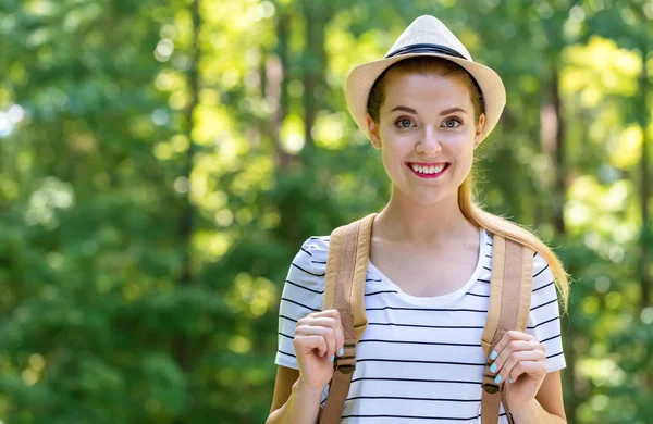 Happy young woman hiking — Stock Photo, Image