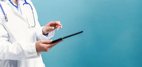 Medical doctor with digital tablet — Stock Photo, Image