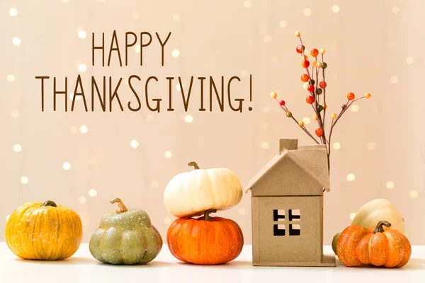 Thanksgiving message with pumpkins with a house — Stock Photo, Image