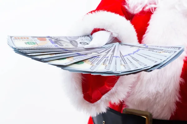 Santa nás drží dolarové bankovky — Stock fotografie