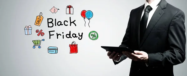 Black Friday com homem segurando tablet computador — Fotografia de Stock