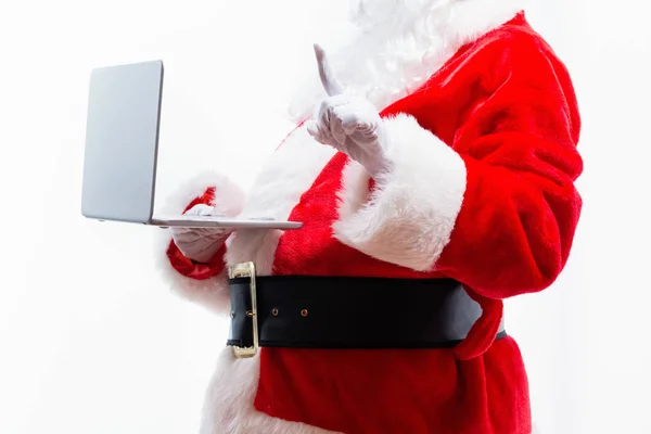 Santa usando um laptop — Fotografia de Stock