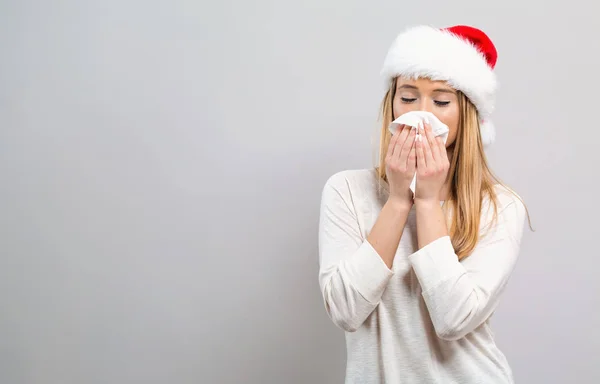 Sick young woman with tissues — Stock Photo, Image