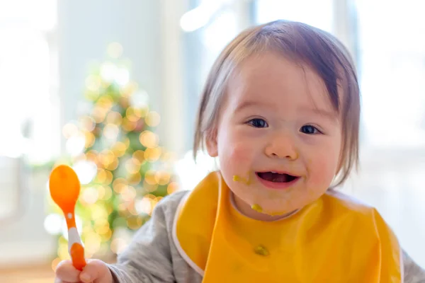 Toddler boy eating a meal — Stock Photo, Image